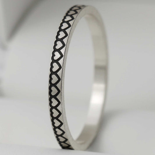 Anneau fin (addon medium) en argent "coeurs" taille 66 - Seconde main